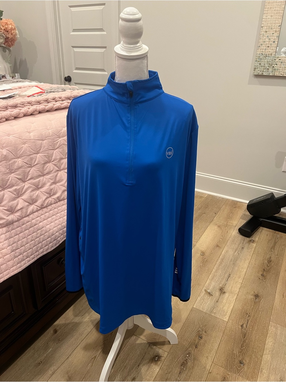 Lightweight Half-Zip Utility Jacket in Royal Blue includes thumb hole for runner